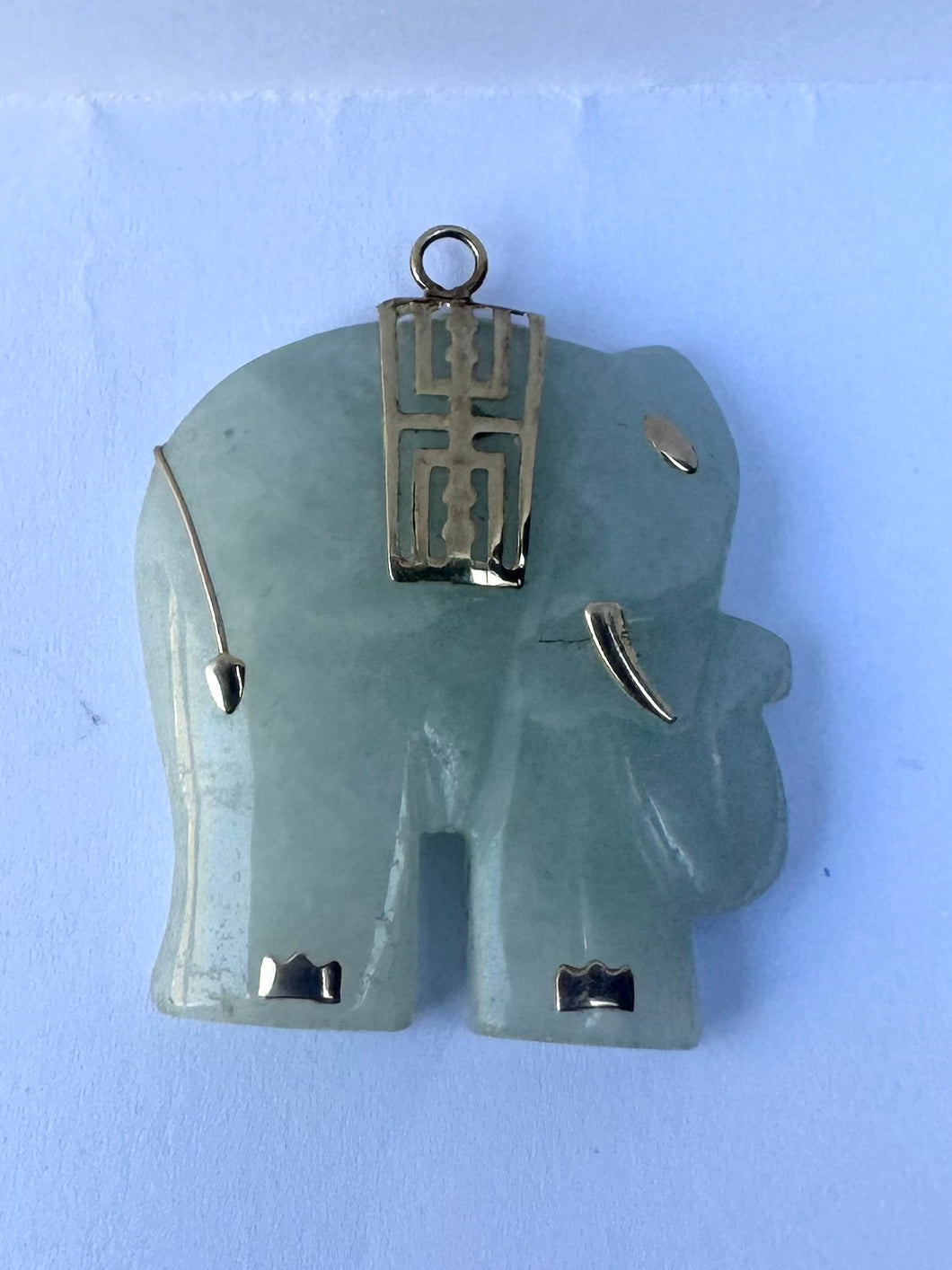 Jade elephant pendant with 14 K gold