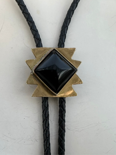 Onyx and brass bolo