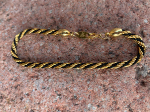 Trifari gold and black twisted bracelet