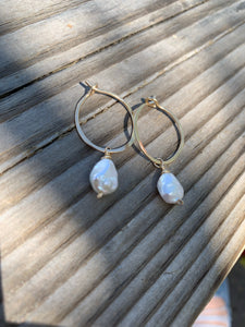 small continuous hoops (gold or silver)