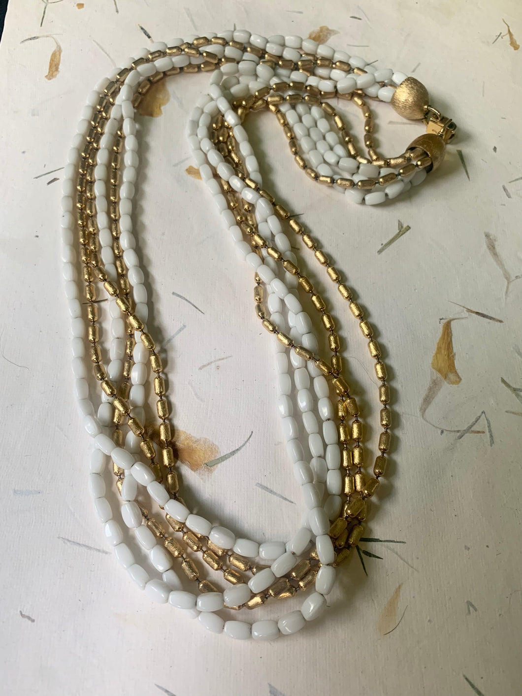 Napier white/gold multi strand