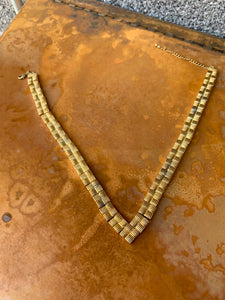 Brass V statement necklace