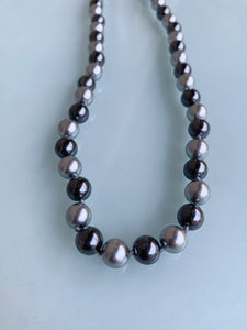 Blue and grey pearls