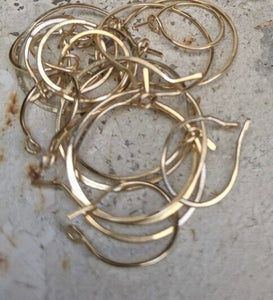 small continuous hoops (gold or silver)
