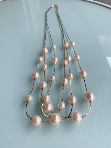 Triple strand with pearls