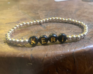 Gold beaded name bracelet