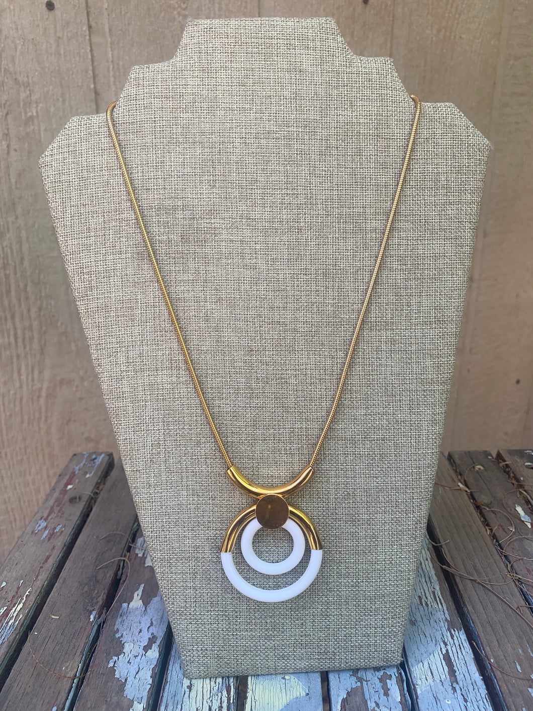 Goldtone and white circle necklace